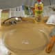 Set up your work area using newspapers or a plastic tarp to protect your table. Organize all of the materials and tools you will be needing so that they are easy to find and within reach. Using either a vegetable spray or oil, lightly cover the ins