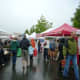 The Edmonds Farmer's Market is popular on a rainy day in June.