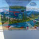 An Interpretive sign posted on the fishing pier describing the salmon life cycle