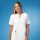 White scrubs with scalloping on neckline and with tone-on-tone embroidery