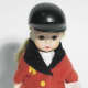 Madame Alexander Equestrian doll in classic red jacket with buff colored breeches