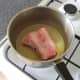 Browning the oxtail in butter and oil