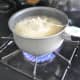 Boil the water and tea bags. Be careful so the paper on the tea bags don't catch on fire.