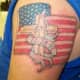 Dad Tattoo of an American Flag, a Cross, and a Banner