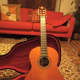 My guitar. An Alhambra Signorita P5. It has a solid red cedar top, gold plated machine heads and a mahogany neck.