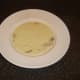 Cream of chicken, asparagus and mushroom soup is ladled in to serving plate