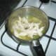 Precooked chicken breast meat is added to soup for last few minutes to heat through