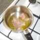 Sealing chicken pieces in olive oil