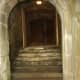 Stone steps lead upwards and in to the crypt in Hamilton Mausoleum