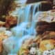 A beautiful waterfall enhances the environment of "The Merion" as a perfect location for your next gathering.