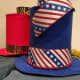 Hats post fabric, ribbon bands, and Mardi Gras beads.