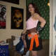 Wardrobe Pirate; Boots, fishnet stockings, skirt, chunky waist belt, corseted top, bangle scarf, and lots of accessories.