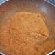 Fry the mustard masala (spice mix) over low heat. 