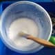 Mix white tacky glue with a little water to form a runny glue mixture.