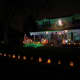 Luminaria and Christmas lights in Littleton neighborhood.