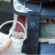 Here you have the cinch in your left hand and the cinch strap hanging off of the saddle.