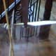 Step 9: A side view of the inserted perches of the pop bottle bird feeder.