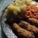 War time vegetarian sausages (2nd World War) made from oats (an acquired taste and very filling), served with mashed potato, baked beans and egg.