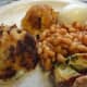 Quick Duchess Potatoes shaped with a potato scoop and served with vegetarian quiche topped with baked beans.