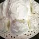 Frost the entire cake with white icing.