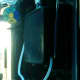 Siphoned airline hose that pulls water from my Aqueon filter directly into the bottom of my upflow algae scrubber