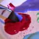 Then, dip the brush into your secondary color, flipping the brush to the other side.