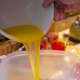 Pour melted Oleo into mix.