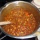 Add all the required ingredients to the meat-free mince and simmer for 15 minutes
