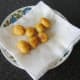Roast oes are drained briefly on kitchen paperpotat