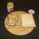 Dijon mustard is spread on the beef tongue