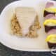 Vegetable shish kebab is plated with tuna and spicy rice