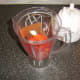 Preparing to blend spicy plum tomato pasta sauce ingredients