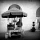 A sweet chestnut vendor who set up his stand with charcoal brazier in the same place on the Piazza di Commune (town square) every day.