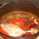 Duck leg casserole removed from the oven