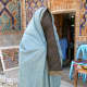 Woman in Uzbekistan wearing a paranja