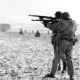 Infantry men of the Third Army battling to releive the men of the 101st Airborne in Bastogne.