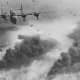 American 15th Air Force B-24s flying through flak and over the destruction created by preceding waves of bombers. Ploiești, Romania (1943). The raids on the Ploiesti oil fields took out Germany's last remaining source of oil.
