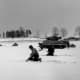 American inftanty and tanks from Patton's Third Army on the attack near Bastogne.