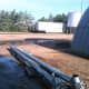 These augers are awaiting installation, and must be kept out of the way of traffic and other construction needs for a few days.
