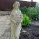 Statue Overseeing Vegetable Garden