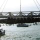 Hunley suspended from a crane after its discovery