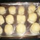 Form pieces into little buns, place on a baking sheet, and brush with raw egg or vegetable oil.