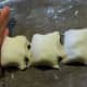 With the help of a palm, "cut" (slice) the roll into pieces.