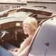 Cheryl sitting in the car KITT.