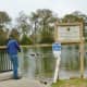 Lions Club Lake with a fisherman