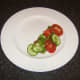 Side salad is arranged on serving plate