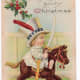 Free vintage Christmas cards: little boy riding an antique rocking horse