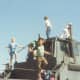 Climbing military vehicle with new acquaintances at Pt. Magu