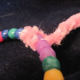 I put beads on my collar ring. This is how the two pipe cleaners attach.