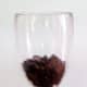 1. Fill bottom of glass with brownie crumbles.